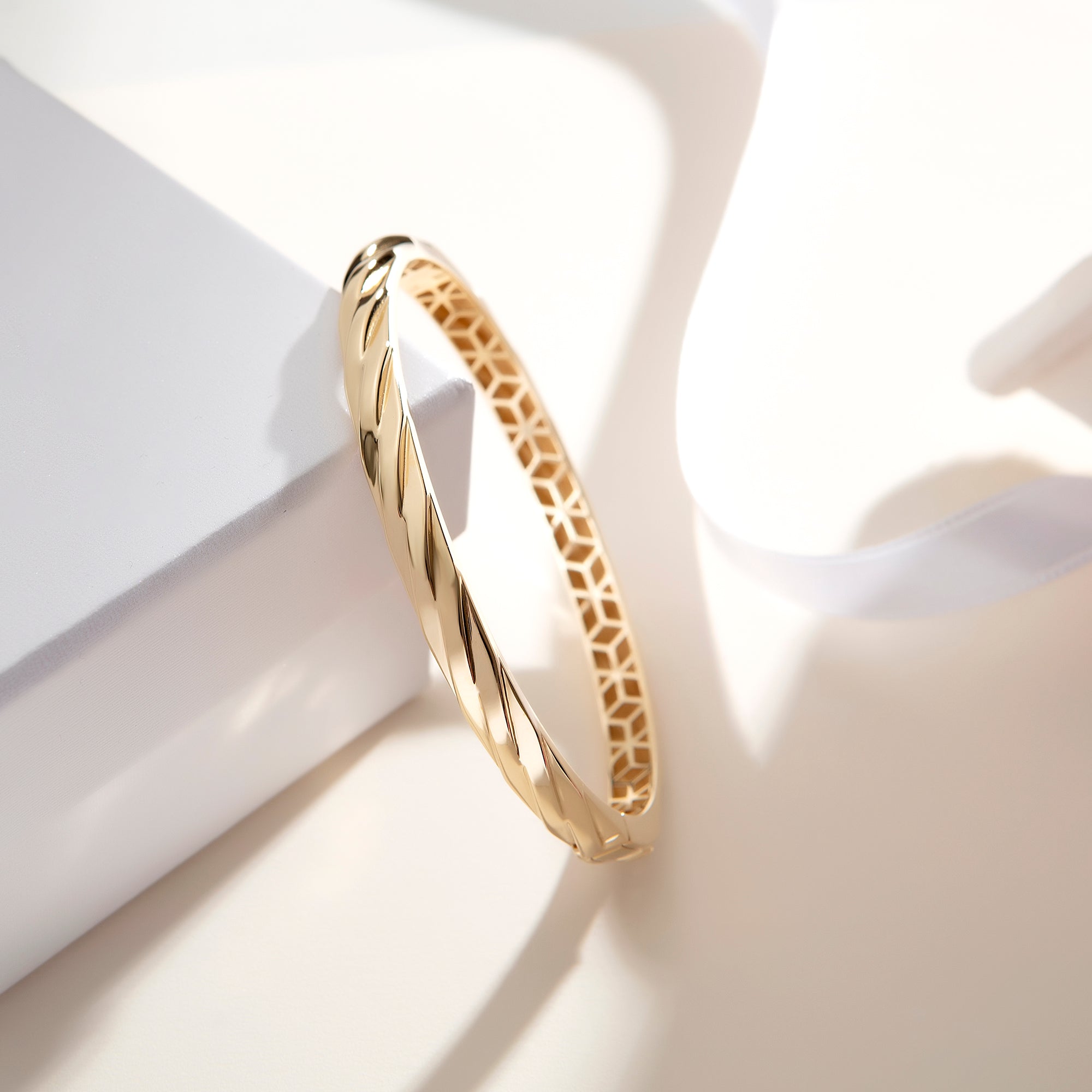 Polished Twist Bangle Bracelet in solid 14K and 18K gold — Kavseyn