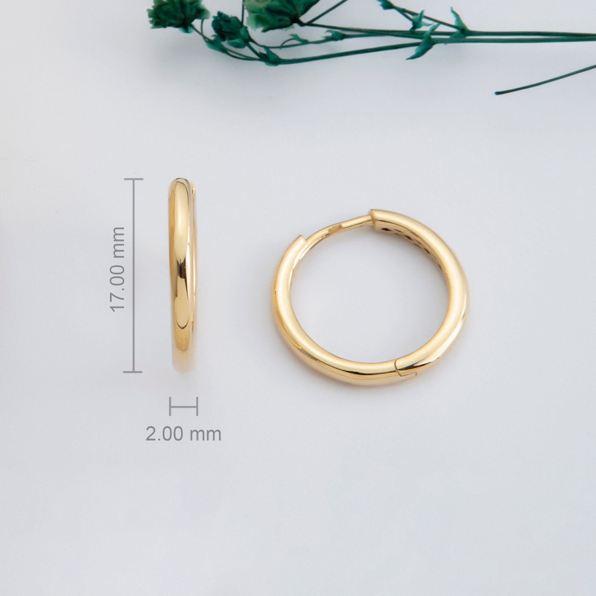 Classic round tube gold hoops close-up — Kavseyn