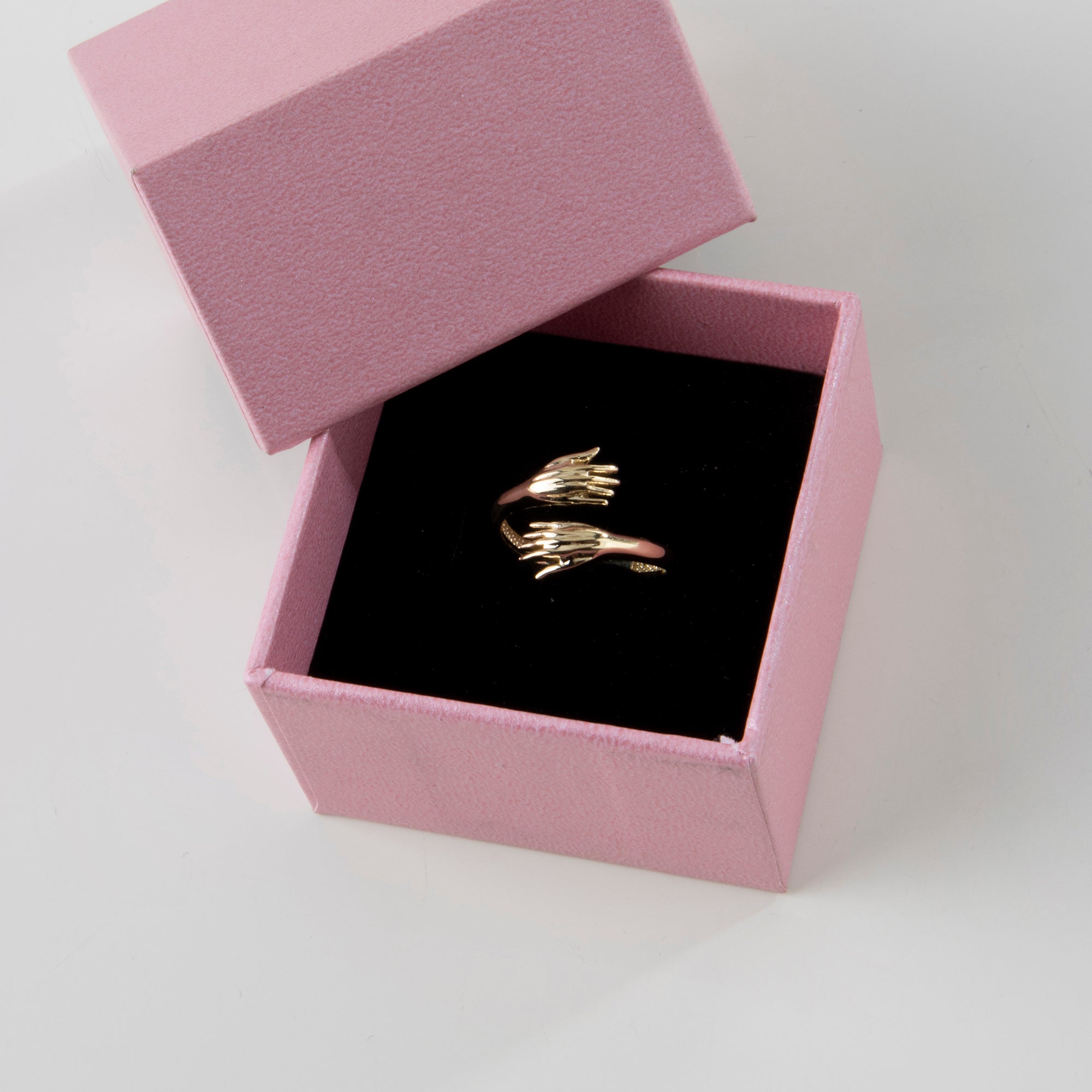 Hug ring with hugging hands motif in solid 14K & 18K gold — Kavseyn