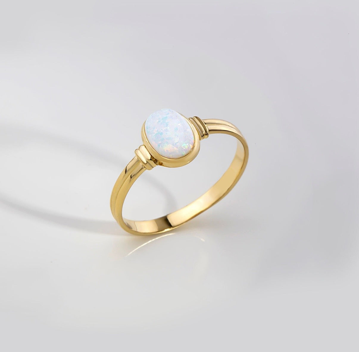 Lab-created oval opal ring in solid 14K & 18K gold — Kavseyn
