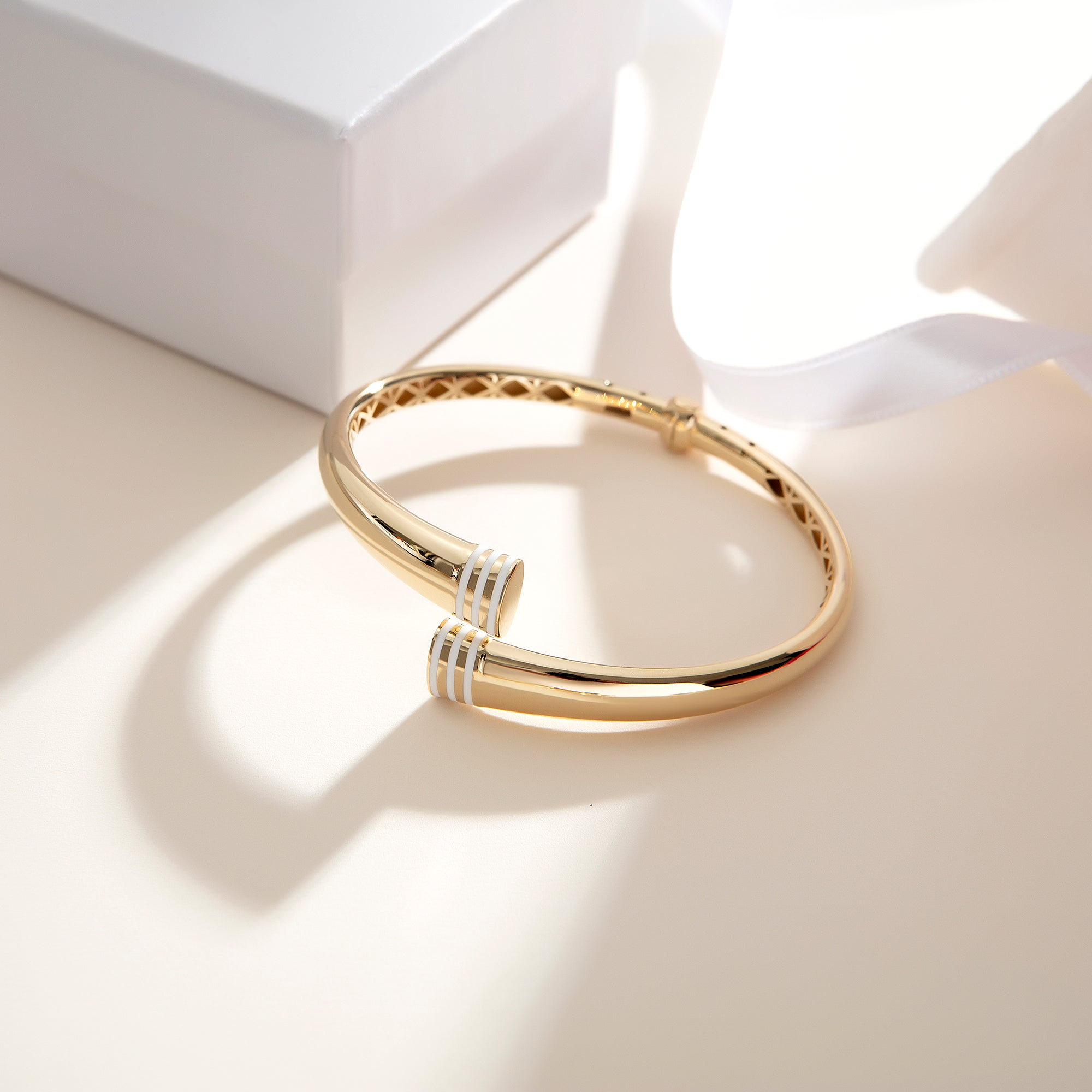 White enamel bypass bangle in solid 14K & 18K gold — Kavseyn