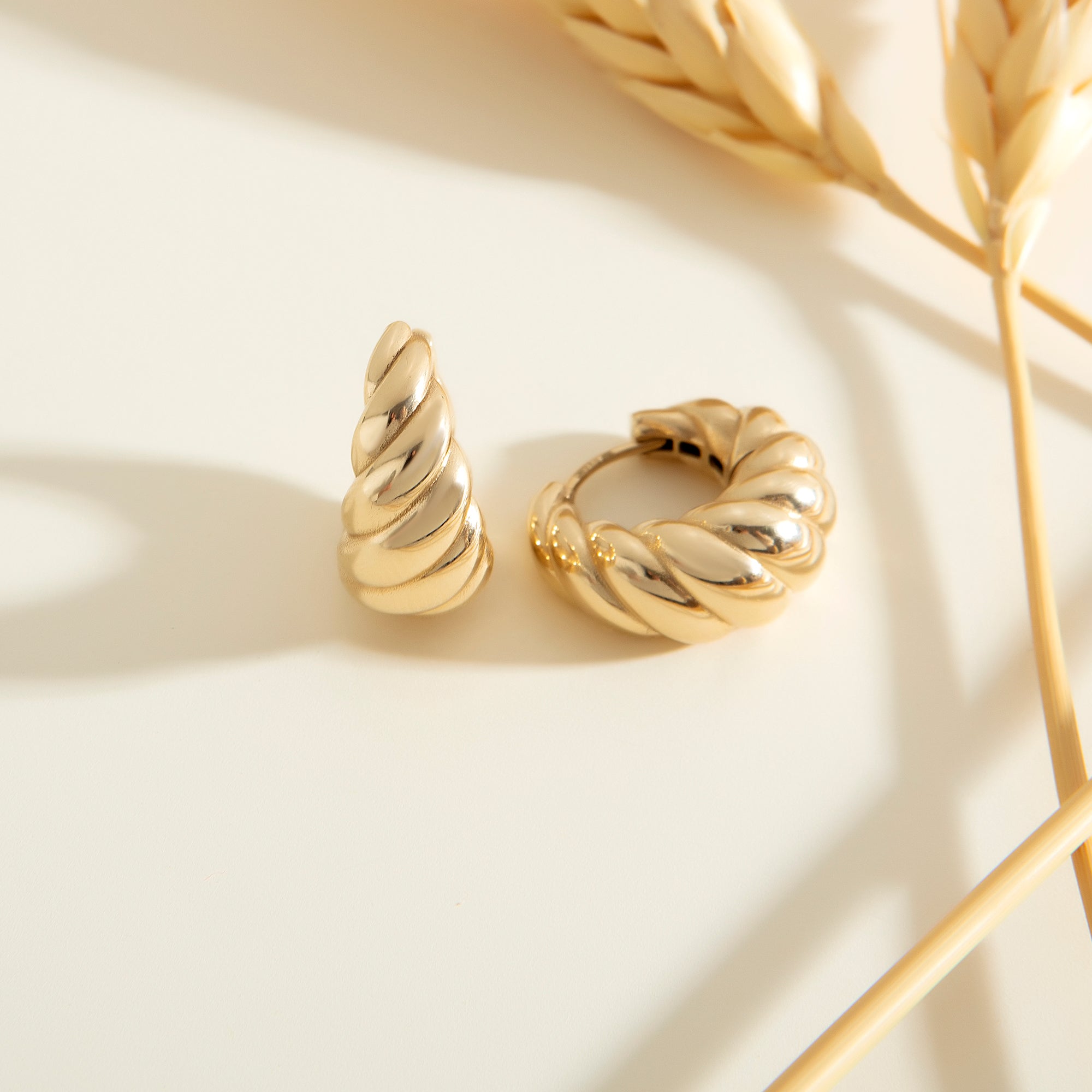 Croissant twisted huggie hoop earrings in solid 14K & 18K gold — Kavseyn