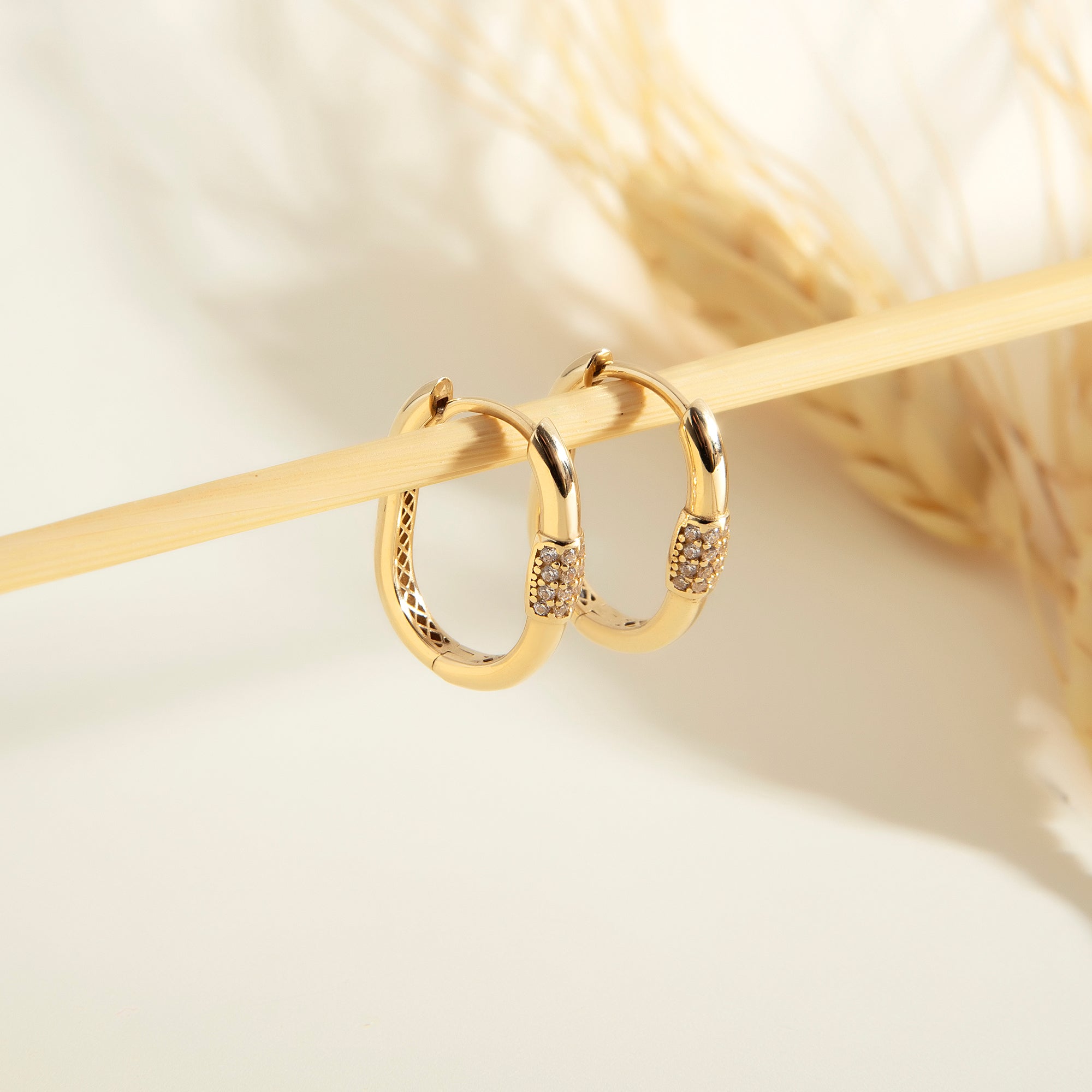 Pavé cubic zirconia bar huggie hoop earrings in solid 14K & 18K gold — Kavseyn