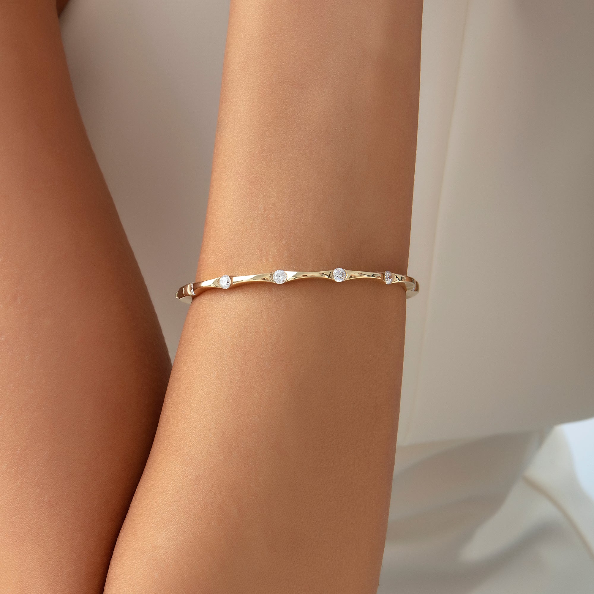 Cubic zirconia station bangle bracelet in solid 14K & 18K gold — Kavseyn