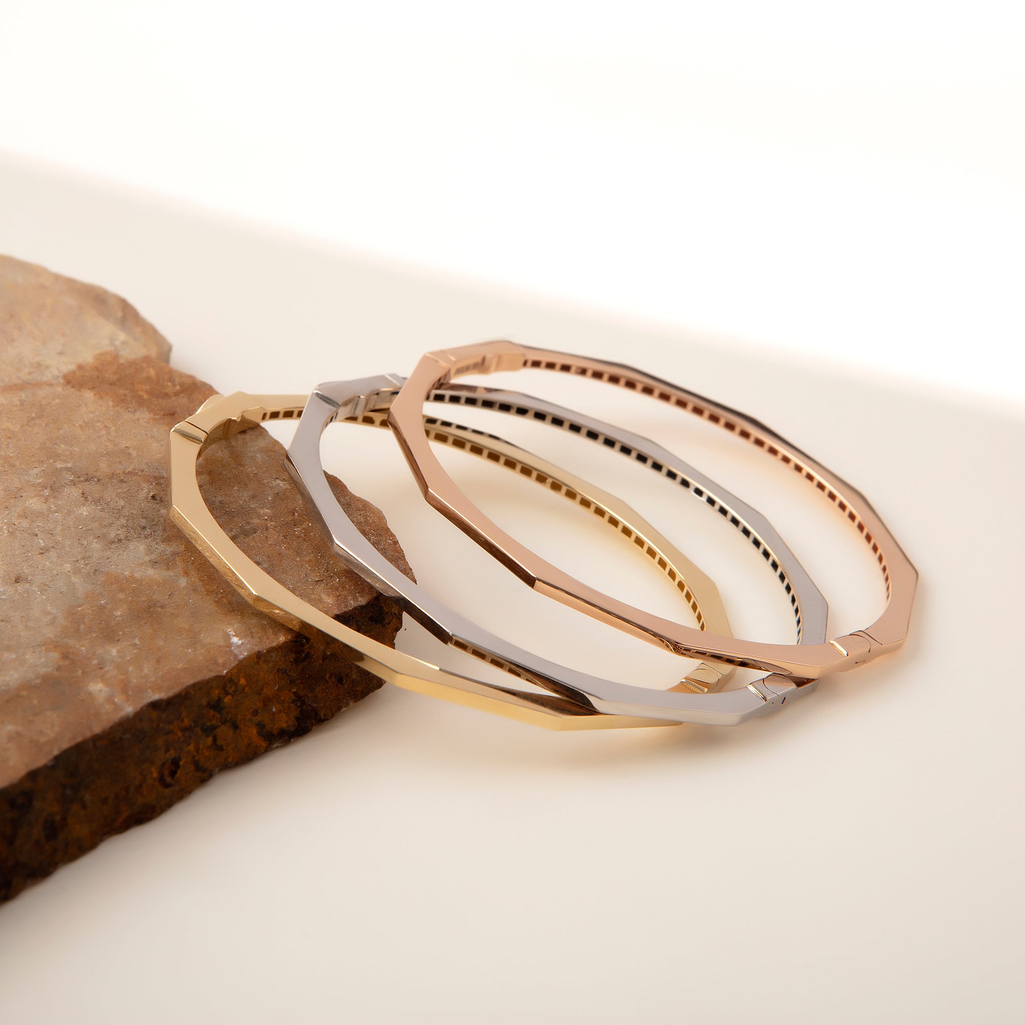 Faceted geometric bangle bracelet in solid 14K & 18K gold — Kavseyn