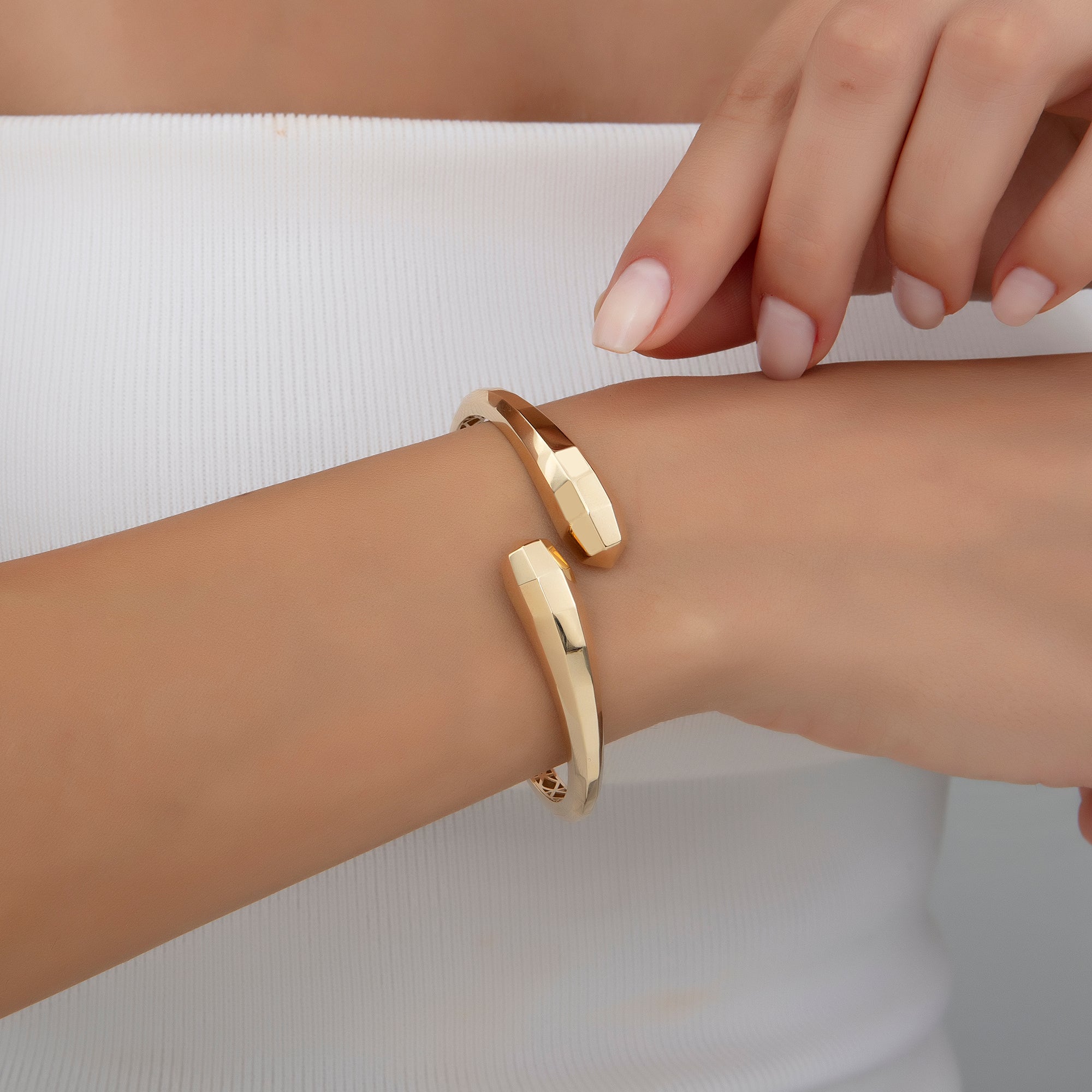 Faceted bypass cuff bracelet in solid 14K & 18K gold — Kavseyn