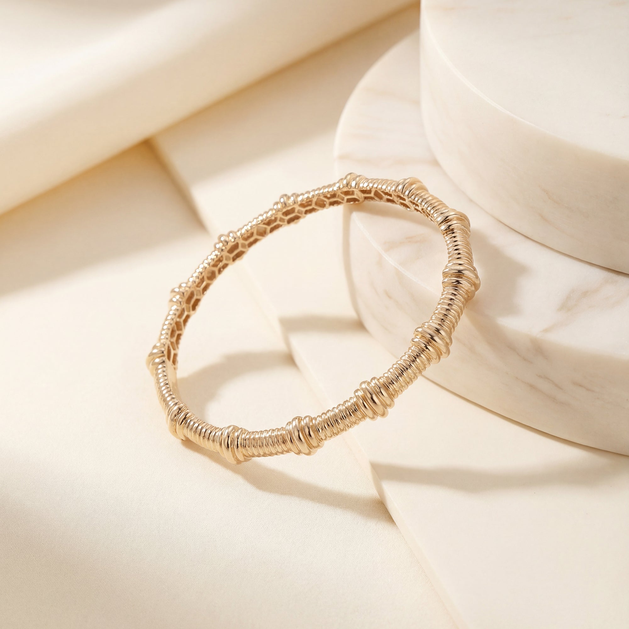 Coiled bangle bracelet in solid 14K & 18K gold — Kavseyn