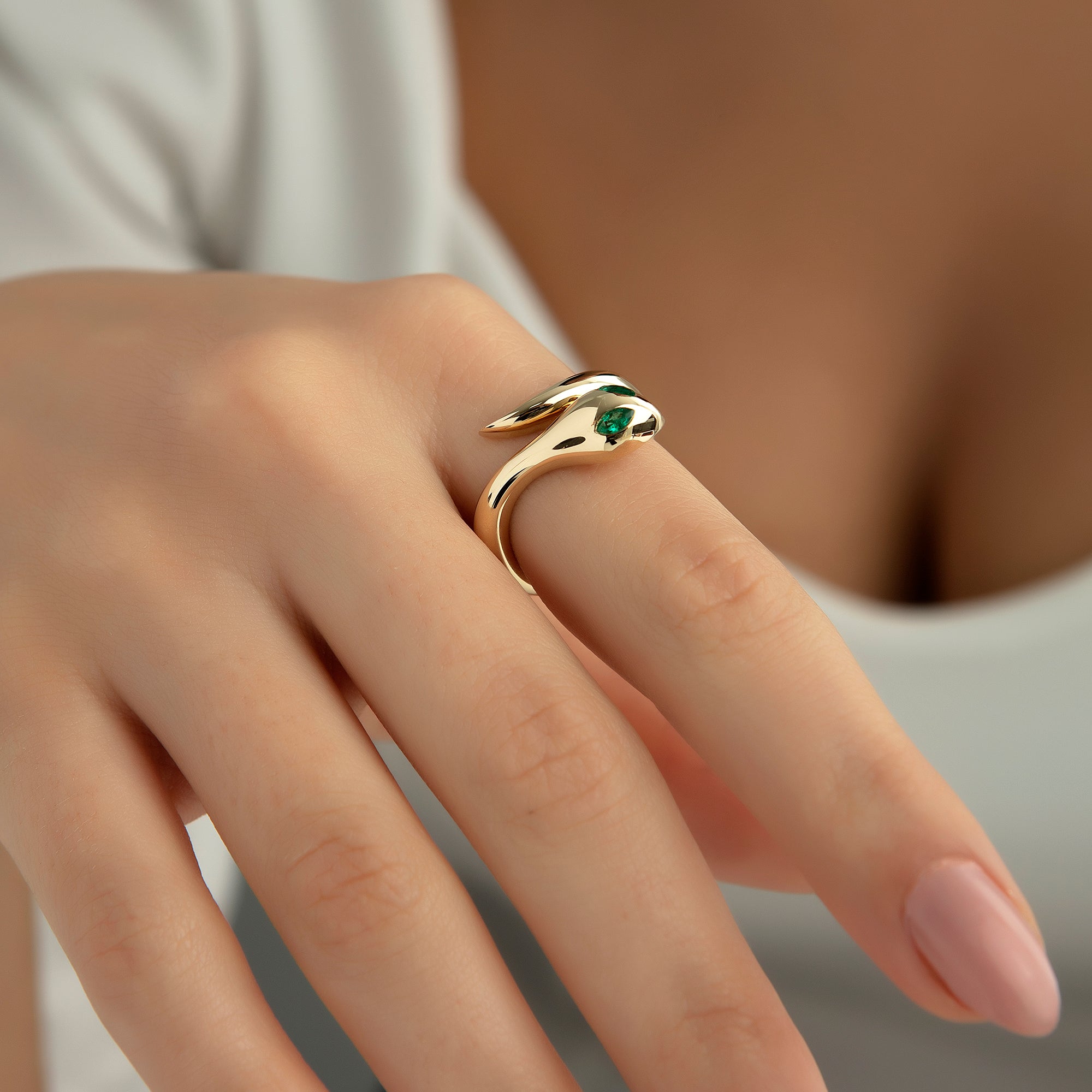 Solid gold snake ring with a stone-set eye, 14K and 18K gold — Kavseyn