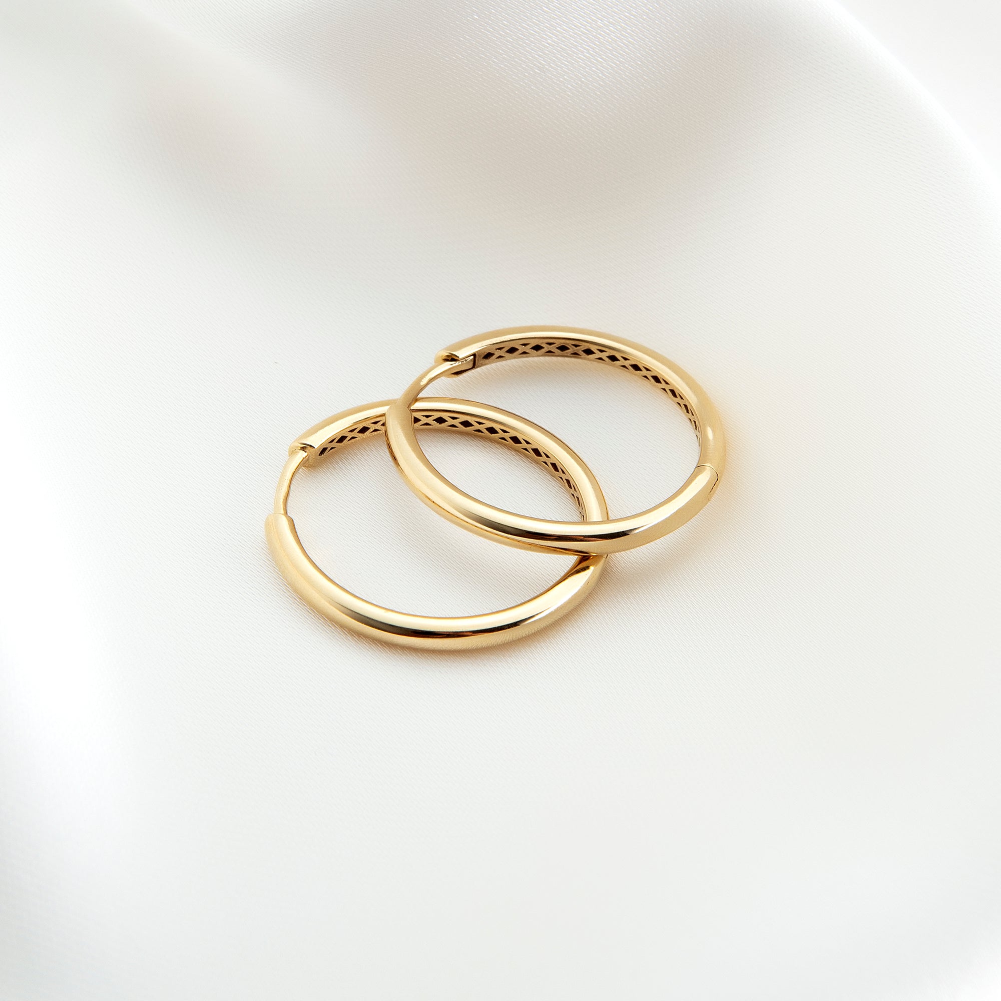 Classic round tube hoop earrings alternate angle — Kavseyn