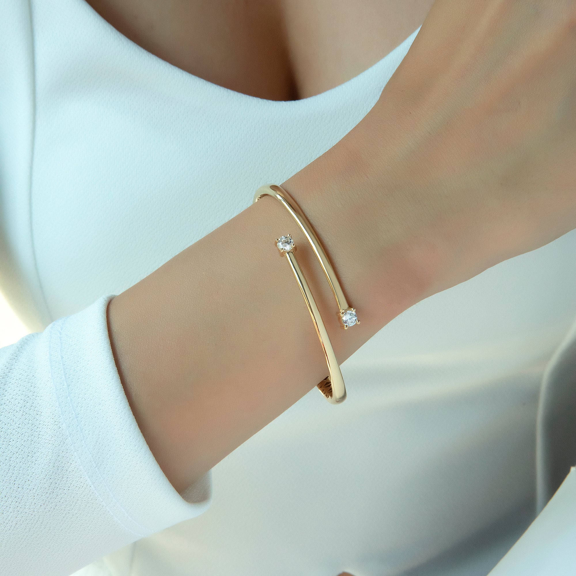 Two stone cubic zirconia bypass bangle in solid 14K & 18K gold — Kavseyn